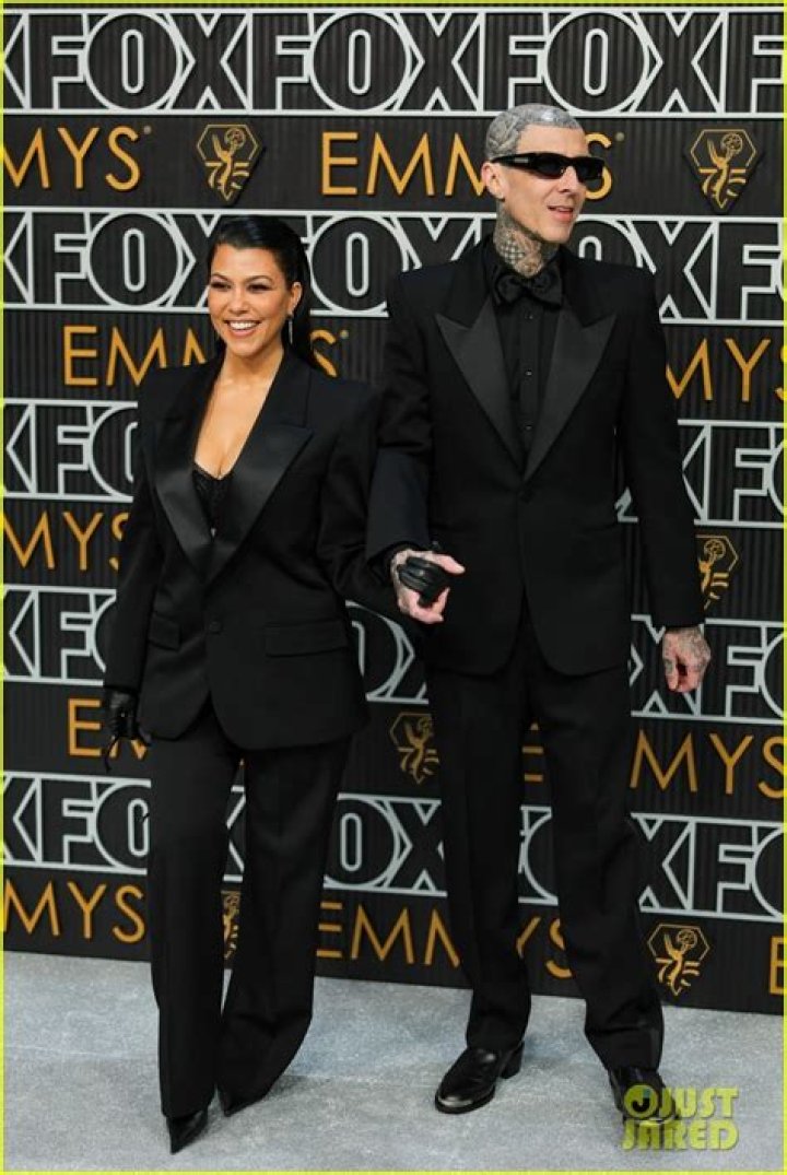 Kourtney Kardashian & Travis Barker Are A Clone Couple In Matching Sweatsuits: Photo